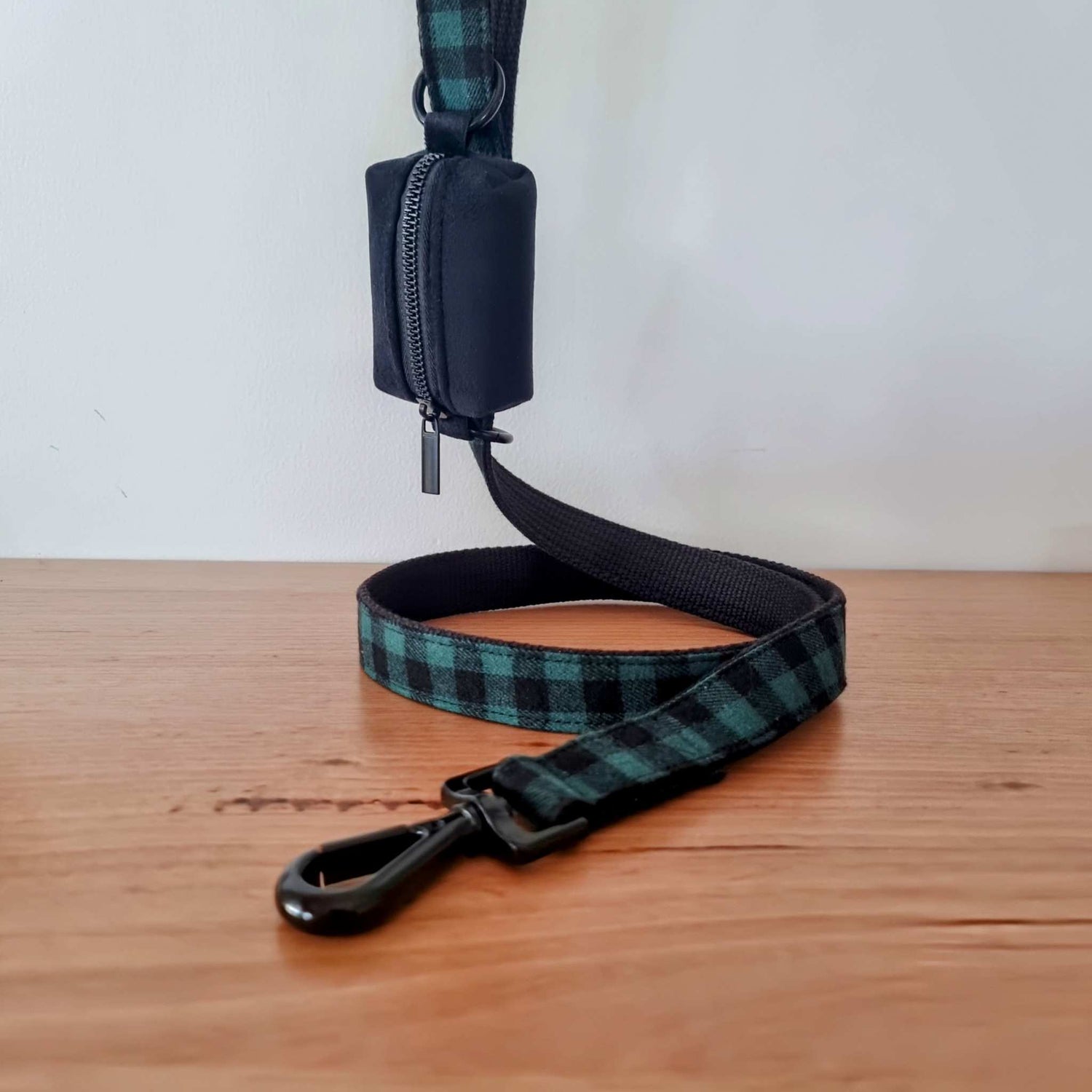 Dog leash and poop bag holder