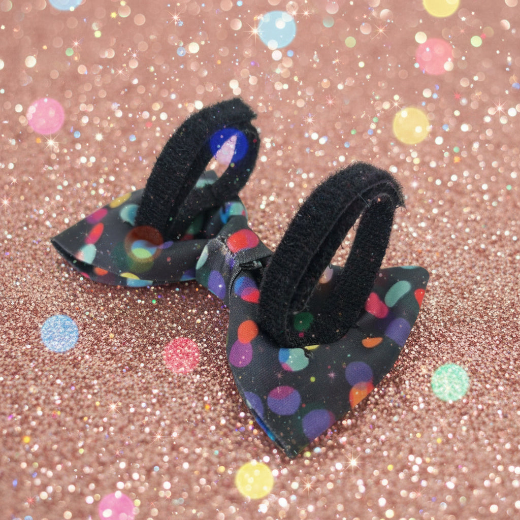 Black polka dot dog bow tie with adjustable straps