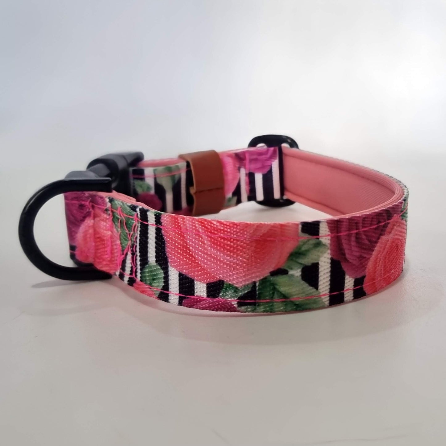 Dog collar with floral pattern on a white background