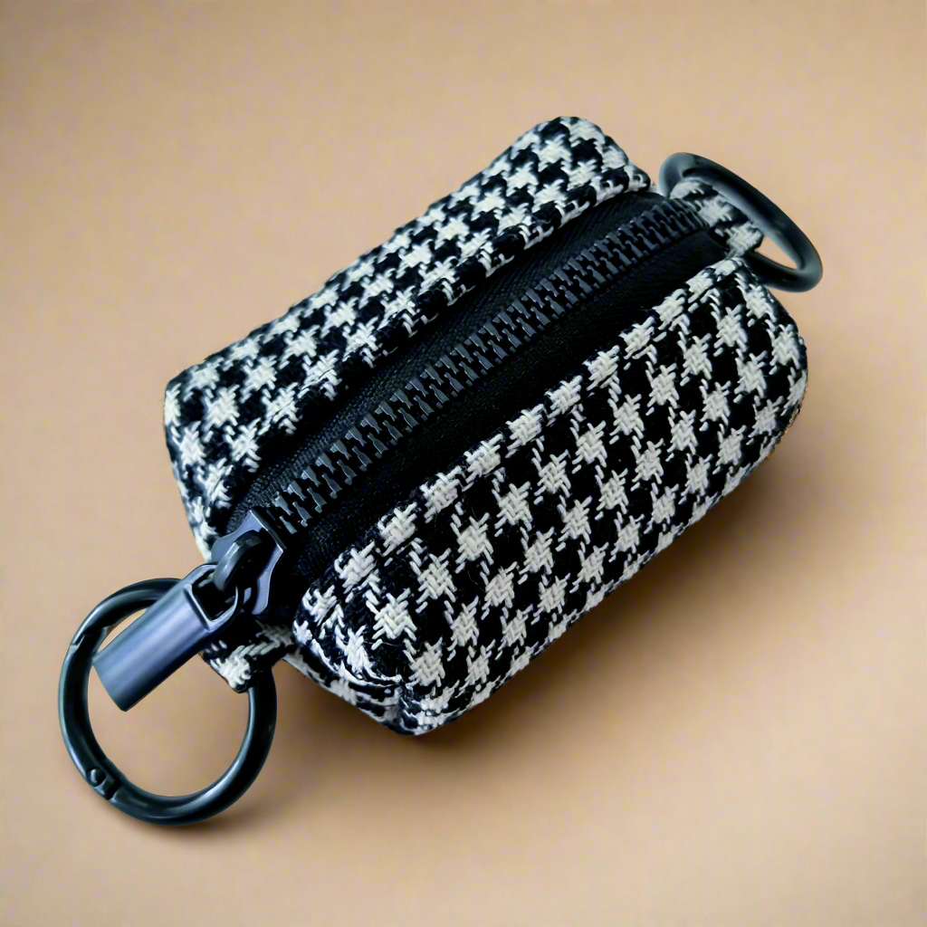 Black and white dog poop bag holder 