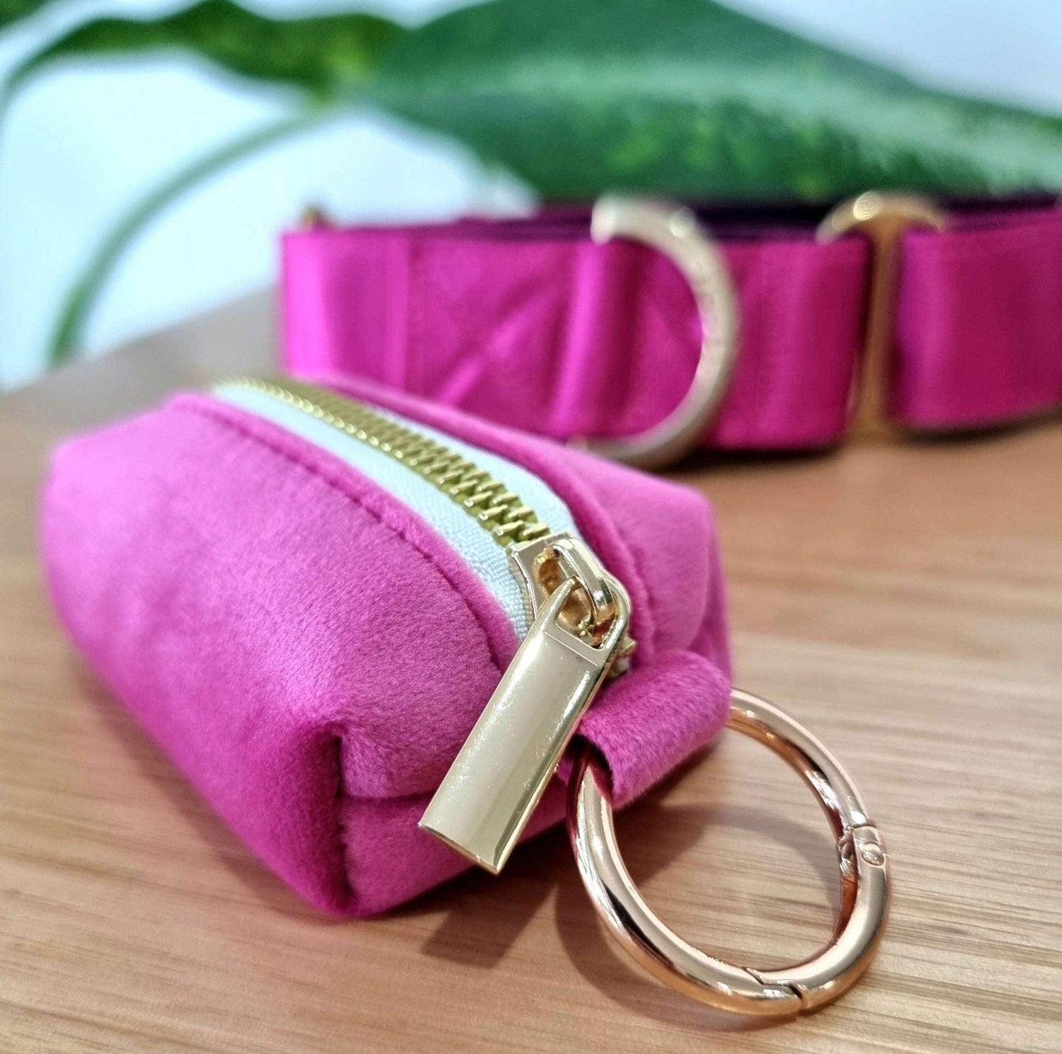 pink and gold dog waste bag holder